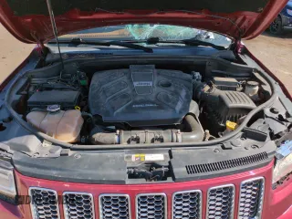 2015 Jeep Grand Cherokee Summit with VIN 1C4RJFJM6FC833687, listed as a Copart auction lot 59620695 with 110,074 mi miles and Salvage title. Bid and sale history available at DreamBid. Image 11.