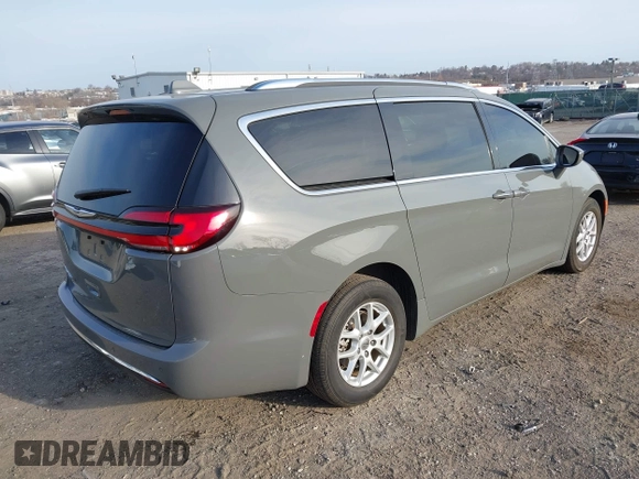 2021 Chrysler Pacifica Touring L with VIN 2C4RC1BG4MR598328, listed as a IAAI auction lot 41749306 with 78,035 mi miles and . Bid and sale history available at DreamBid. Image 4.
