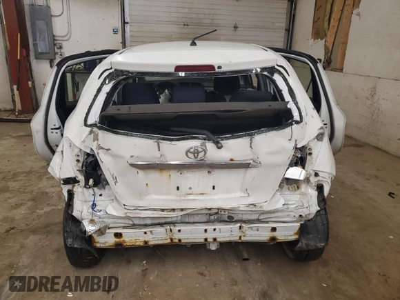 2012 Toyota Yaris L with VIN JTDKTUD32CD532746, listed as a Copart auction lot 51666455 with 238,797 mi miles and Salvage Title. Bid and sale history available at carsss.com. Image 6.