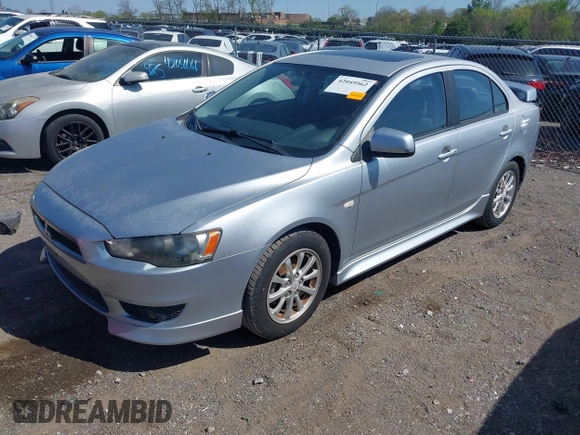 2011 Mitsubishi Lancer ES with VIN JA32U2FU0BU012663, listed as a IAAI auction lot 42049562 with 116,361 mi miles. Bid and sale history available at carsss.com. Image 2.