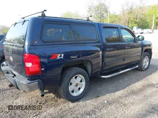 2009 Chevrolet Silverado 1500 LT with VIN 3GCEK23329G133613, listed as a IAAI auction lot 42146668 with 242,456 mi miles and . Bid and sale history available at DreamBid. Image 4.