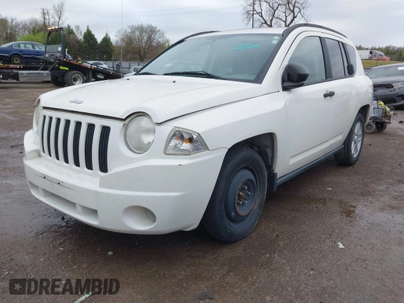 2007 Jeep Compass Sport with VIN 1J8FF47W27D138211, listed as a IAAI auction lot 41959389 with 165,834 mi miles. Bid and sale history available at carsss.com. Image 2.