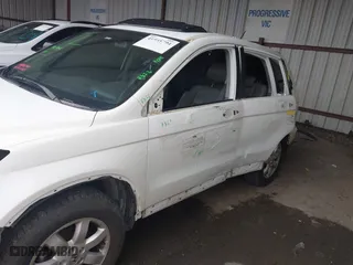 2009 Honda CR-V EX-L with VIN JHLRE387X9C003580, listed as a IAAI auction lot 41945794 with 131,061 mi miles. Bid and sale history available at carsss.com. Image 6.