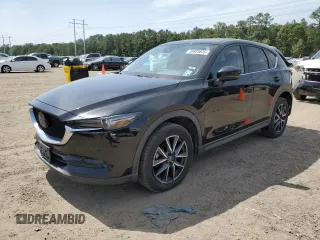 2018 Mazda CX-5 Grand Touring z VIN JM3KFADM2J1381752, wystawiony jako Copart lot #56889835 z przebiegiem 96 820 mil mil oraz Szkoda całkowita • Salvage title. Historia ofert i sprzedaży dostępna na DreamBid. Obrazek 1.