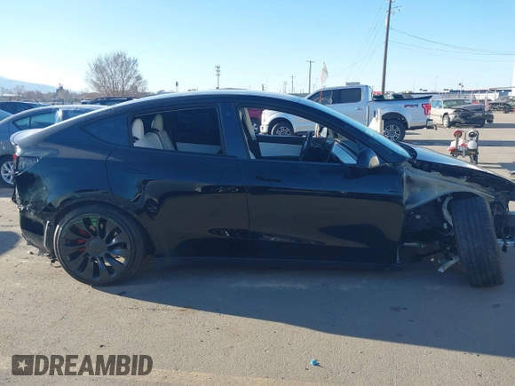 2022 Tesla Model Y Performance with VIN 7SAYGDEF0NF447541, listed as a IAAI auction lot 41762592 with 41,204 mi miles and . Bid and sale history available at DreamBid. Image 14.