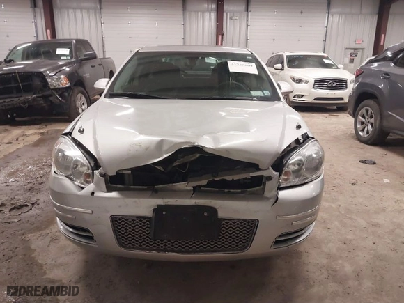 2015 Chevrolet Impala Limited LT with VIN 2G1WB5E36F1141195, listed as a IAAI auction lot 41735809 with NaN miles. Bid and sale history available at carsss.com. Image 12.