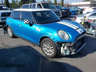 2015 MINI Hardtop 4 Door S z VIN WMWXU3C54F2B58513, wystawiony jako IAAI lot #41376804 z przebiegiem 110 186 mil mil oraz . Historia ofert i sprzedaży dostępna na DreamBid. Obrazek 1.