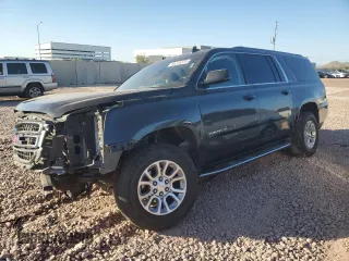 2015 GMC Yukon XL SLE with VIN 1GKS2GKC8FR536268, listed as a Copart auction lot 84226374 with 174,544 mi miles and Salvage Title. Bid and sale history available at carsss.com. Image 1.