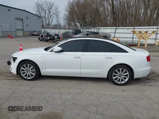2013 Audi A6 Premium Plus z VIN WAUGGAFC3DN081065, wystawiony jako IAAI lot #41931342 z przebiegiem 136 570 mil mil oraz . Historia ofert i sprzedaży dostępna na DreamBid. Obrazek 14.