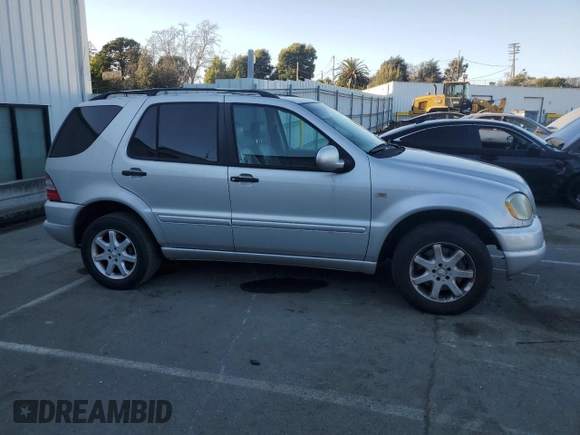 2000 Mercedes-Benz M 320/430/500 with VIN 4JGAB72E0YA167962, listed as a Copart auction lot 89158575 with 194,471 mi miles and Salvage title. Bid and sale history available at DreamBid. Image 4.