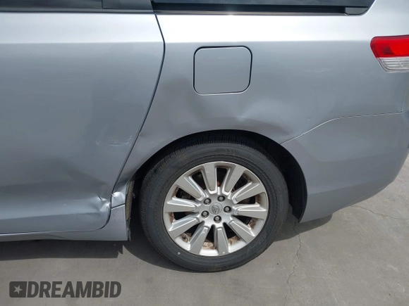 2014 Toyota Sienna LE with VIN 5TDJK3DC1ES080711, listed as a IAAI auction lot 41910679 with 118,788 mi miles and . Bid and sale history available at DreamBid. Image 6.