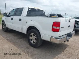 2004 Ford F-150 XLT with VIN 1FTPW12534KD74981, listed as a IAAI auction lot 42086802 with 323,592 mi miles. Bid and sale history available at carsss.com. Image 3.