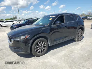 2018 Mazda CX-5 Touring with VIN JM3KFACM0J1408075, listed as a Copart auction lot 50866735 with Not Provided miles and Salvage Title. Bid and sale history available at carsss.com. Image 1.