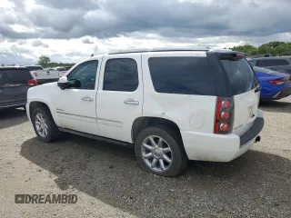 2014 GMC Yukon Denali with VIN 1GKS2EEF1ER212412, listed as a Copart auction lot 50954565 with 115,964 mi miles and Salvage Title. Bid and sale history available at carsss.com. Image 2.