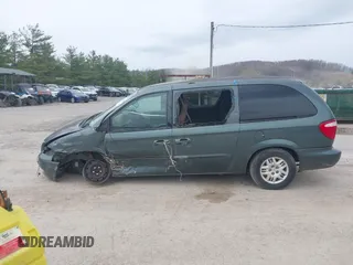 2003 Dodge Grand Caravan with VIN 2D4GP44313R240791, listed as a IAAI auction lot 41937009 with 231,913 mi miles and . Bid and sale history available at DreamBid. Image 13.