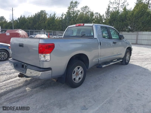 2010 Toyota Tundra 2WD Truck with VIN 5TFRU5F13AX024097, listed as a IAAI auction lot 41473230 with 196,411 mi miles. Bid and sale history available at carsss.com. Image 4.