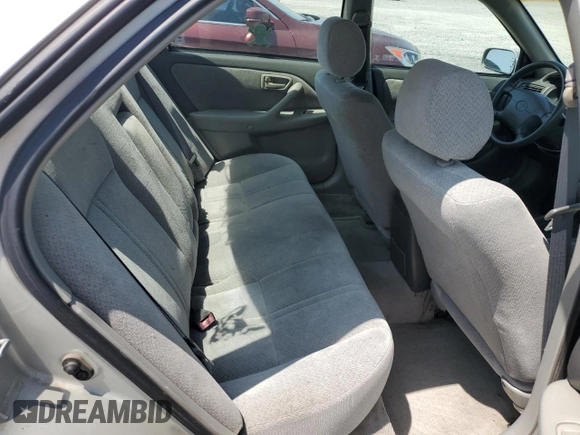 2000 Toyota Camry CE z VIN 4T1BG22K2YU663536, wystawiony jako Copart lot #60101425 z przebiegiem 109 342 mil mil oraz Czysty tytuł • Clean title. Historia ofert i sprzedaży dostępna na DreamBid. Obrazek 10.