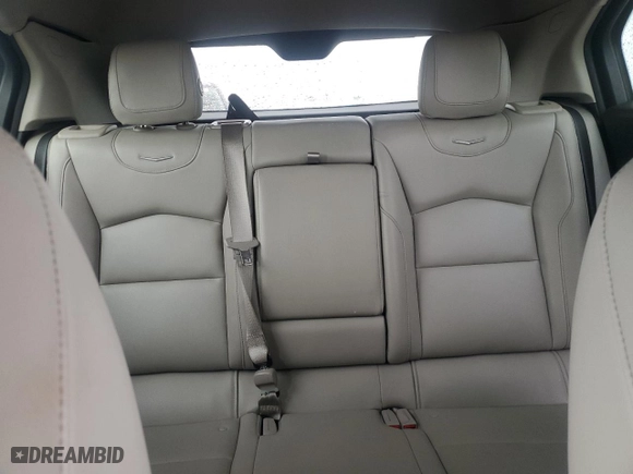 2023 Cadillac XT4 FWD Luxury with VIN 1GYAZAR45PF218684, listed as a Copart auction lot 54427565 with 74,920 mi miles and Salvage Title. Bid and sale history available at carsss.com. Image 10.