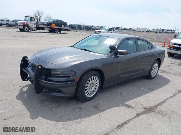 2020 Dodge Charger Police with VIN 2C3CDXKT3LH112023, listed as a IAAI auction lot 42124903 with 130,738 mi miles. Bid and sale history available at carsss.com. Image 2.