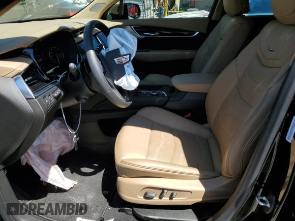 2023 Cadillac XT6 AWD Premium Luxury z VIN 1GYKPFRS2PZ162059, wystawiony jako Copart lot #63882963 z przebiegiem 6 567 mil mil oraz . Historia ofert i sprzedaży dostępna na DreamBid. Obrazek 7.
