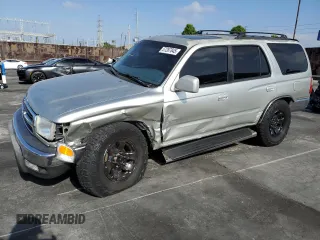 2000 Toyota 4Runner SR5 z VIN JT3GN86R4Y0159902, wystawiony jako Copart lot #57287845 z przebiegiem 174 742 mil mil oraz Szkoda całkowita • Salvage title. Historia ofert i sprzedaży dostępna na DreamBid. Obrazek 1.