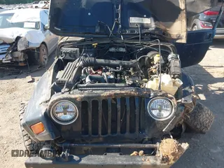 1999 Jeep Wrangler Sahara with VIN 1J4FY49S2XP466068, listed as a IAAI auction lot 42062789 with Not provided miles and . Bid and sale history available at DreamBid. Image 10.
