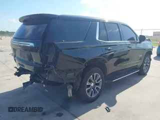 2023 Chevrolet Tahoe LT z VIN 1GNSCNKDXPR477061, wystawiony jako IAAI lot #42225743 z przebiegiem 57 077 mil mil oraz . Historia ofert i sprzedaży dostępna na DreamBid. Obrazek 4.