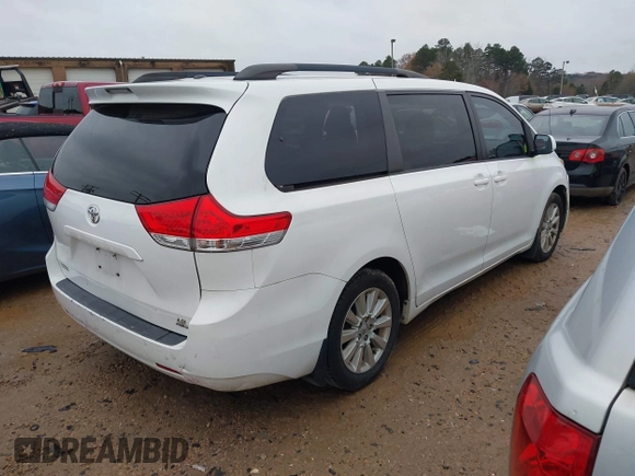 2012 Toyota Sienna LE with VIN 5TDJK3DC3CS048579, listed as a IAAI auction lot 41055074 with 202,791 mi miles. Bid and sale history available at carsss.com. Image 4.