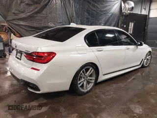 2019 BMW 7 Series 740i xDrive with VIN WBA7E4C59KGV70391, listed as a IAAI auction lot 41531991 with 70,017 mi miles and . Bid and sale history available at carsss.com. Image 4.