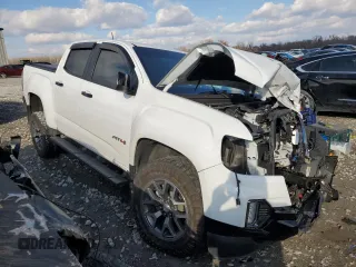 2022 GMC Canyon 4WD AT4 w/Leather with VIN 1GTG6FEN1N1110836, listed as a Copart auction lot 84113554 with 35,889 mi miles and Salvage Title. Bid and sale history available at carsss.com. Image 4.