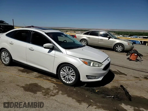 2015 Ford Focus Titanium with VIN 1FADP3J23FL300126, listed as a Copart auction lot 54434165 with 176,526 mi miles and Salvage title. Bid and sale history available at DreamBid. Image 13.