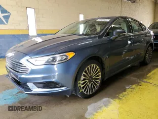 2018 Ford Fusion SE z VIN 3FA6P0HD4JR202859, wystawiony jako Copart lot #62916365 z przebiegiem 90 617 mil mil oraz Czysty tytuł • Clean title. Historia ofert i sprzedaży dostępna na DreamBid. Obrazek 1.