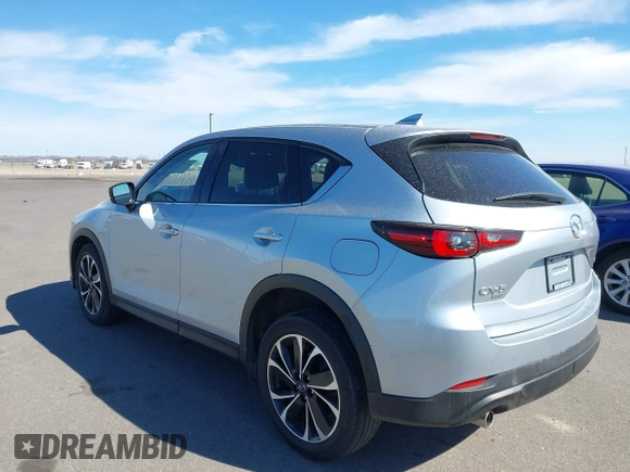 2023 Mazda CX-5 2.5 S Premium Package with VIN JM3KFBDM9P0173453, listed as a IAAI auction lot 41807979 with 34,156 mi miles. Bid and sale history available at carsss.com. Image 3.