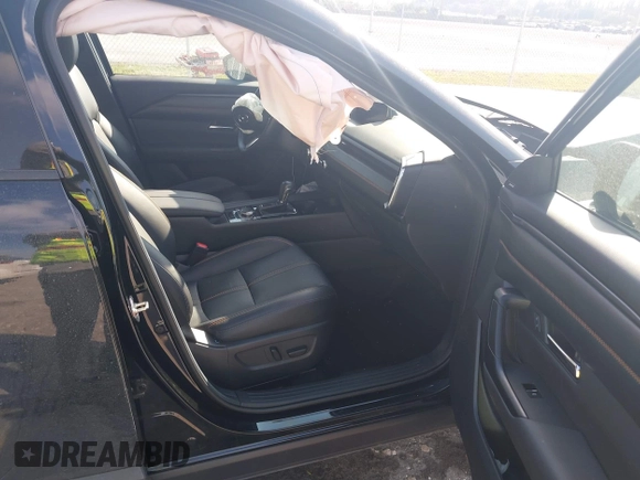 2023 Mazda CX-50 S Premium Plus with VIN 7MMVABEM1PN141344, listed as a IAAI auction lot 41473823 with 12,120 mi miles and . Bid and sale history available at DreamBid. Image 5.