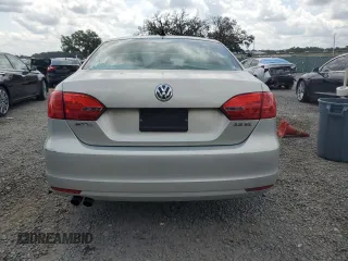 2011 Volkswagen Jetta SE z VIN 3VWDX7AJ0BM319621, wystawiony jako Copart lot #58808615 z przebiegiem 65 829 mil mil oraz Szkoda całkowita • Salvage title. Historia ofert i sprzedaży dostępna na DreamBid. Obrazek 6.