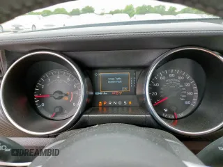 2023 Ford Mustang EcoBoost с VIN 1FA6P8TH9P5112854, выставлен на аукционе Copart как лот 56073805 с пробегом 23 481 миль миль и Списание • Salvage title. История ставок и продаж доступна на DreamBid. Изображение 9.