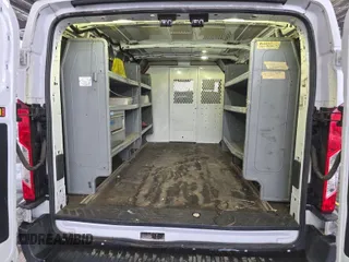 2016 Ford Transit Cargo with VIN 1FTYE1YM9GKB18600, listed as a IAAI auction lot 42726792 with 127,434 mi miles and . Bid and sale history available at DreamBid. Image 1.