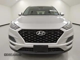 2021 Hyundai Tucson Value with VIN KM8J33A42MU392228, listed as a Copart auction lot 49471815 with 141,637 mi miles and Clean Title. Bid and sale history available at DreamBid. Image 5.