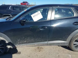 2018 Mazda CX-3 Touring with VIN JM1DKDC70J0325325, listed as a IAAI auction lot 40914334 with 63,978 mi miles. Bid and sale history available at carsss.com. Image 14.