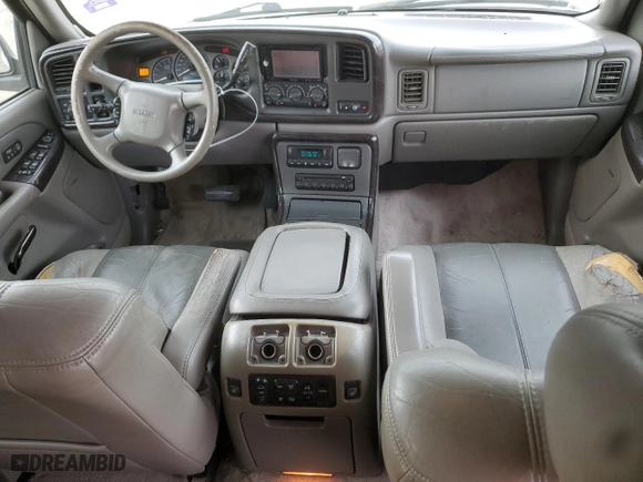 2001 GMC Yukon Denali with VIN 1GKEK63U31J261351, listed as a Copart auction lot 72768274 with 258,596 mi miles and Salvage Title. Bid and sale history available at carsss.com. Image 8.
