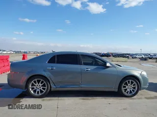 2009 Chevrolet Malibu LTZ with VIN 1G1ZK57B39F146580, listed as a IAAI auction lot 41687211 with 293,395 mi miles and . Bid and sale history available at DreamBid. Image 13.