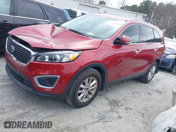 2018 Kia Sorento LX z VIN 5XYPG4A39JG400774, wystawiony jako IAAI lot #41711055 z przebiegiem 56 046 mil mil oraz . Historia ofert i sprzedaży dostępna na DreamBid. Obrazek 17.