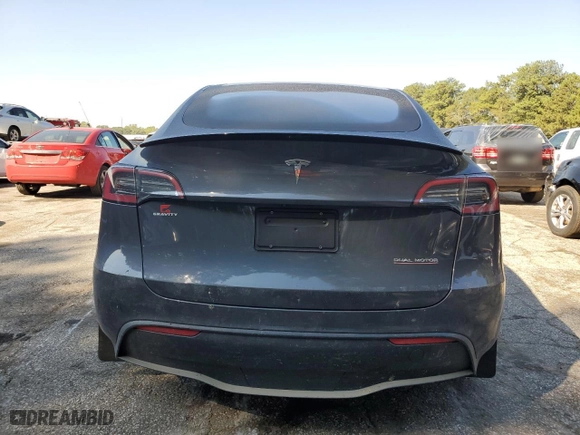 2022 Tesla Model Y Performance with VIN 7SAYGDEF4NF521270, listed as a Copart auction lot 74144264 with 0 mi miles and Salvage Title. Bid and sale history available at carsss.com. Image 6.