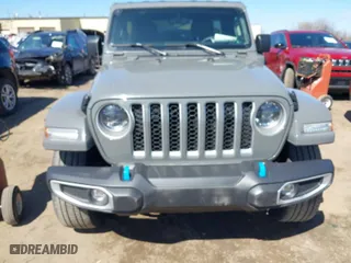 2023 Jeep Wrangler 4xe Sahara with VIN 1C4JJXP62PW696002, listed as a IAAI auction lot 41891127 with 44,567 mi miles. Bid and sale history available at carsss.com. Image 6.