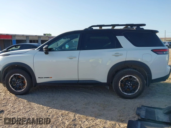 2023 Nissan Pathfinder Rock Creek with VIN 5N1DR3BD6PC254342, listed as a IAAI auction lot 41950069 with 26,144 mi miles and . Bid and sale history available at DreamBid. Image 14.