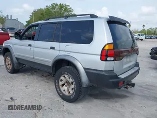 2003 Mitsubishi Montero Sport XLS with VIN JA4MT31R03J023679, listed as a IAAI auction lot 41872682 with 148,365 mi miles. Bid and sale history available at carsss.com. Image 3.