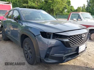 2024 Mazda CX-50 S Premium z VIN 7MMVABDM7RN231991, wystawiony jako IAAI lot #42481427 z przebiegiem 7 843 mil mil oraz . Historia ofert i sprzedaży dostępna na DreamBid. Obrazek 20.