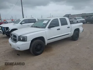 2006 Dodge Dakota SLT with VIN 1D7HE48K56S532946, listed as a IAAI auction lot 41878467 with 106,218 mi miles. Bid and sale history available at carsss.com. Image 2.