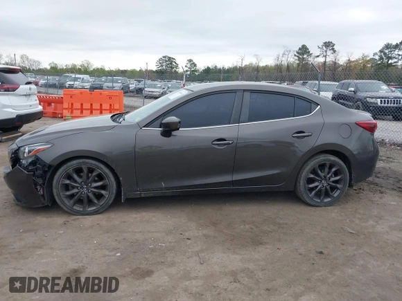 2014 Mazda 3 S Grand Touring with VIN JM1BM1W39E1145186, listed as a IAAI auction lot 41948404 with 111,702 mi miles and . Bid and sale history available at DreamBid. Image 14.