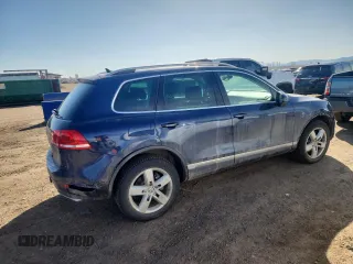 2012 Volkswagen Touareg Sport z VIN WVGFK9BP9CD000509, wystawiony jako Copart lot #48507095 z przebiegiem 164 283 mil mil oraz Szkoda całkowita • Salvage title. Historia ofert i sprzedaży dostępna na DreamBid. Obrazek 3.